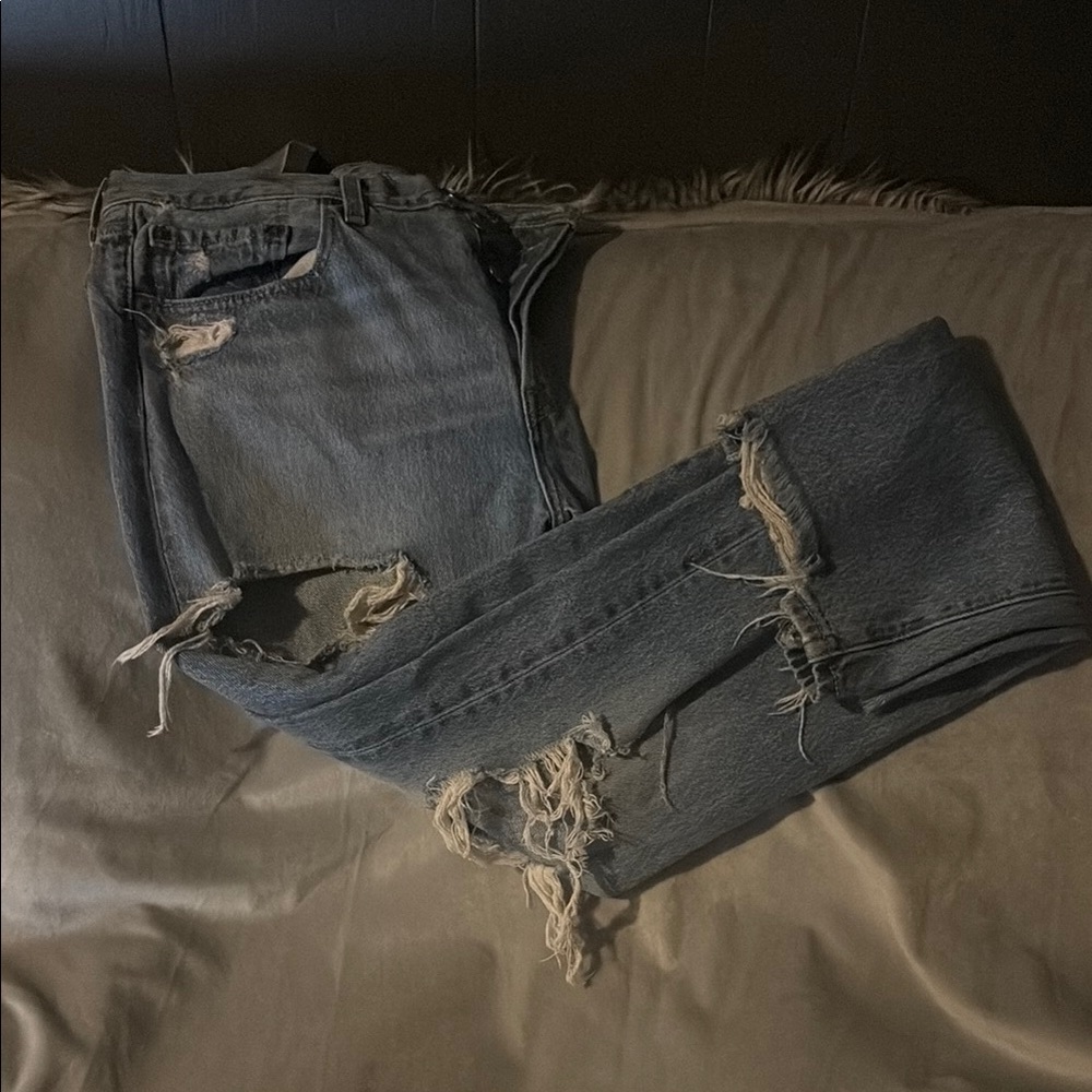 501 Distressed Levi Blue Jeans